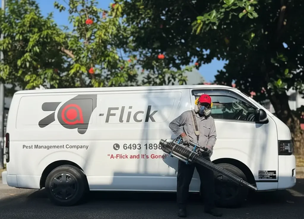 A-Flick technician posing beside van