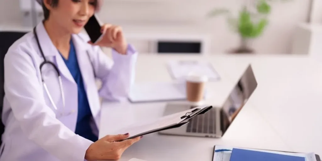 a healthcare professional managing administration work