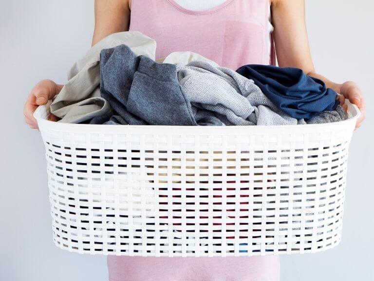 a person preparing for laundry