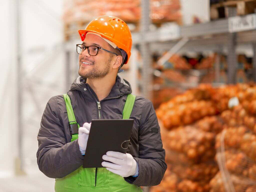 a person working in a food factory