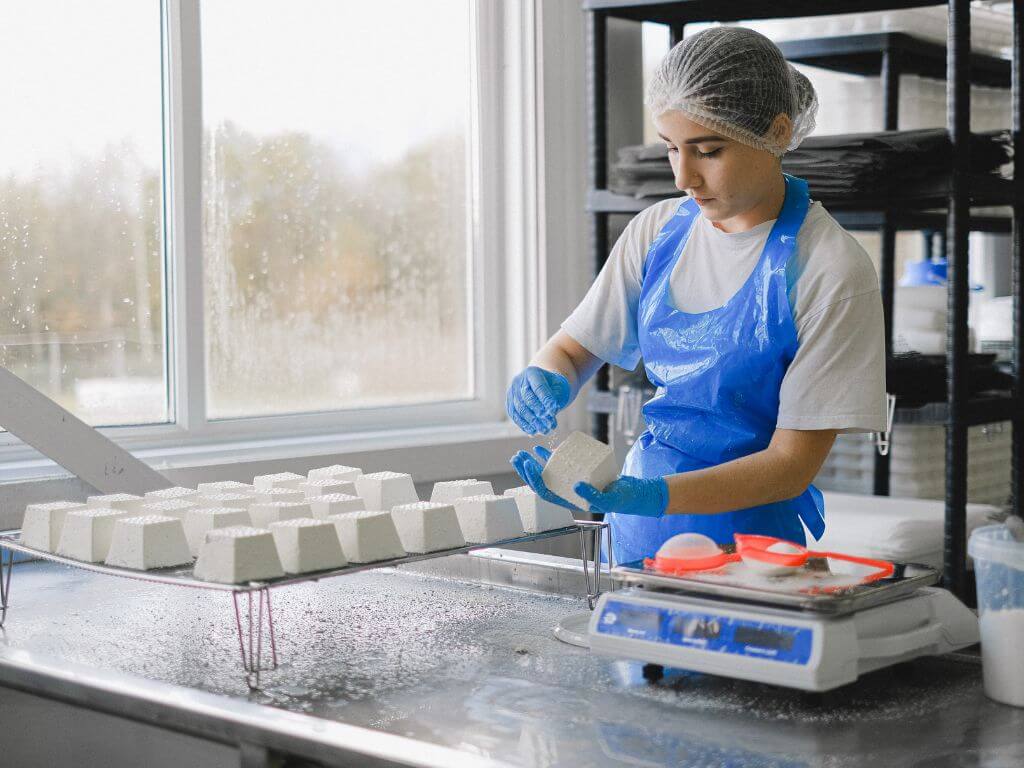 a worker in a food factory