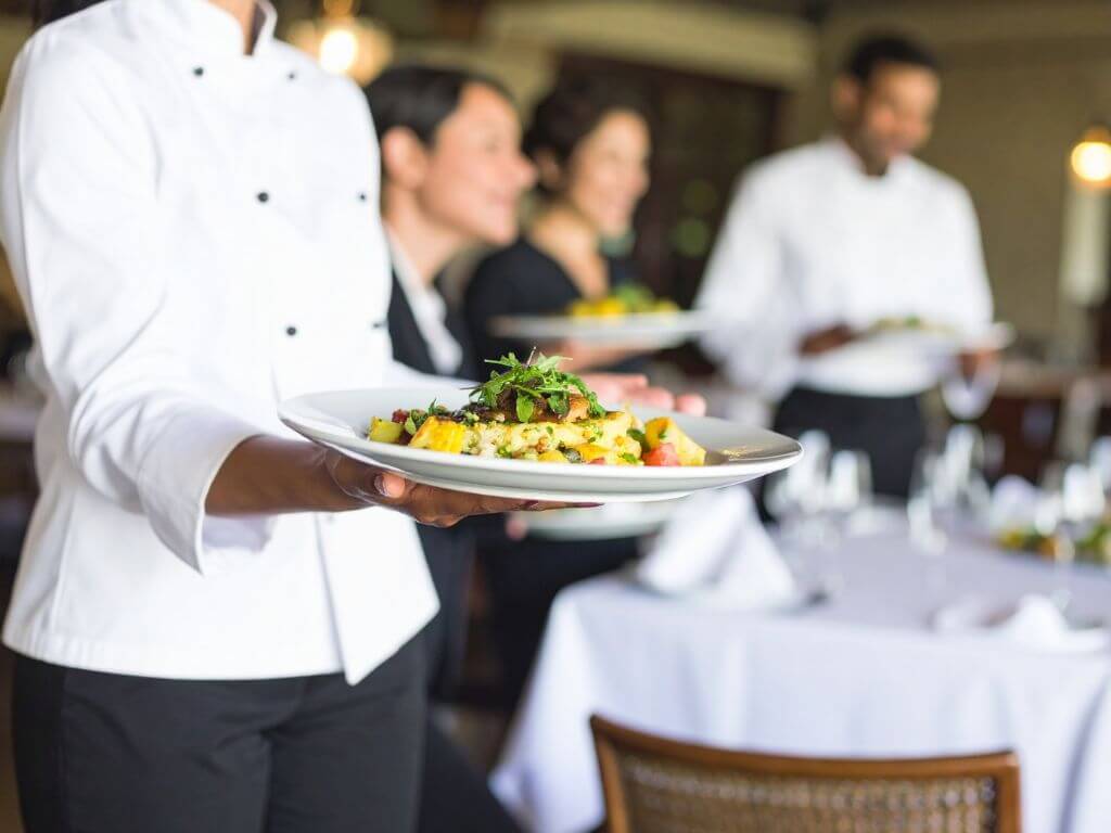 waiter serving food in a restaurant